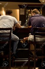 99914213-two-men-sitting-at-a-bar.jpg