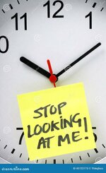 clock-watching-yellow-sticky-note-message-stop-looking-me-written-stuck-to-office-wall-as-conc...jpg